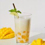 glass of mango boba tea and mango hedgehogs